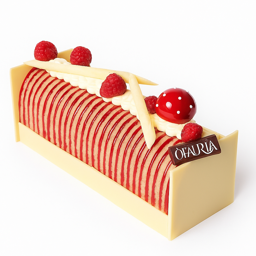 Bûche Casino ÔFAURIA, biscuit joconde rayé rouge, mousseline vanille, framboises et décor en chocolat blanc – vue trois-quarts
